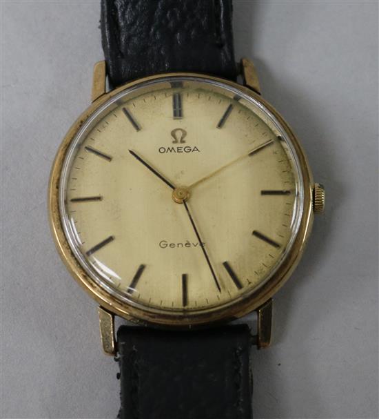 A gentlemans yellow metal Omega manual wind wrist watch.